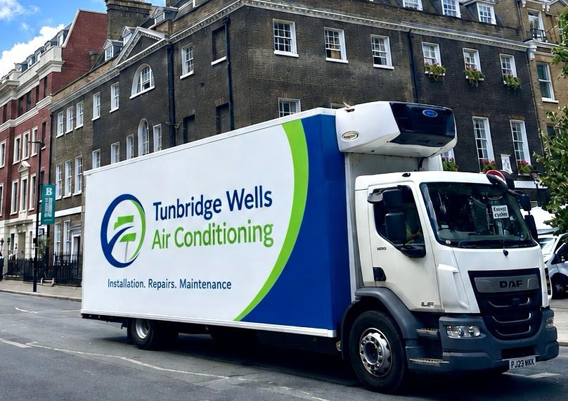 Tunbridge Wells Air Conditioning branded van parked outside a period building